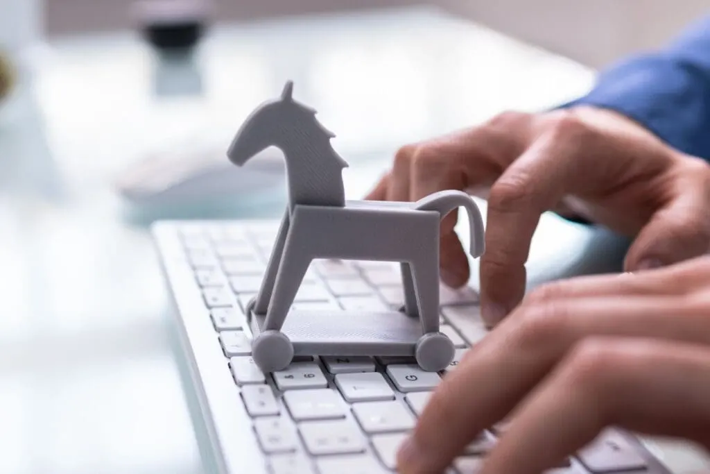 image of a Trojan horse on a keyboard
